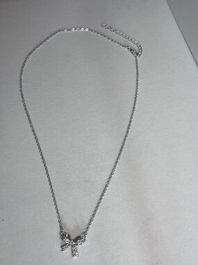 Silver Bow Pendant Necklace with Crystal Accents - Silver
